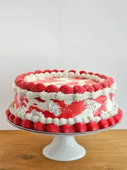 Red and white vintage buttercream cake