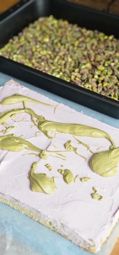 Pistachio roll cake filling in progress